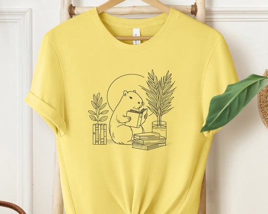"Cute Capybara Bookworm Unisex Soft Cotton T-shirt for Book and Animal Lovers"