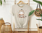 "Watercolor Cat Holding Coffee Cup Soft Cotton T-shirt - Perfect Gift for Cat Lovers"