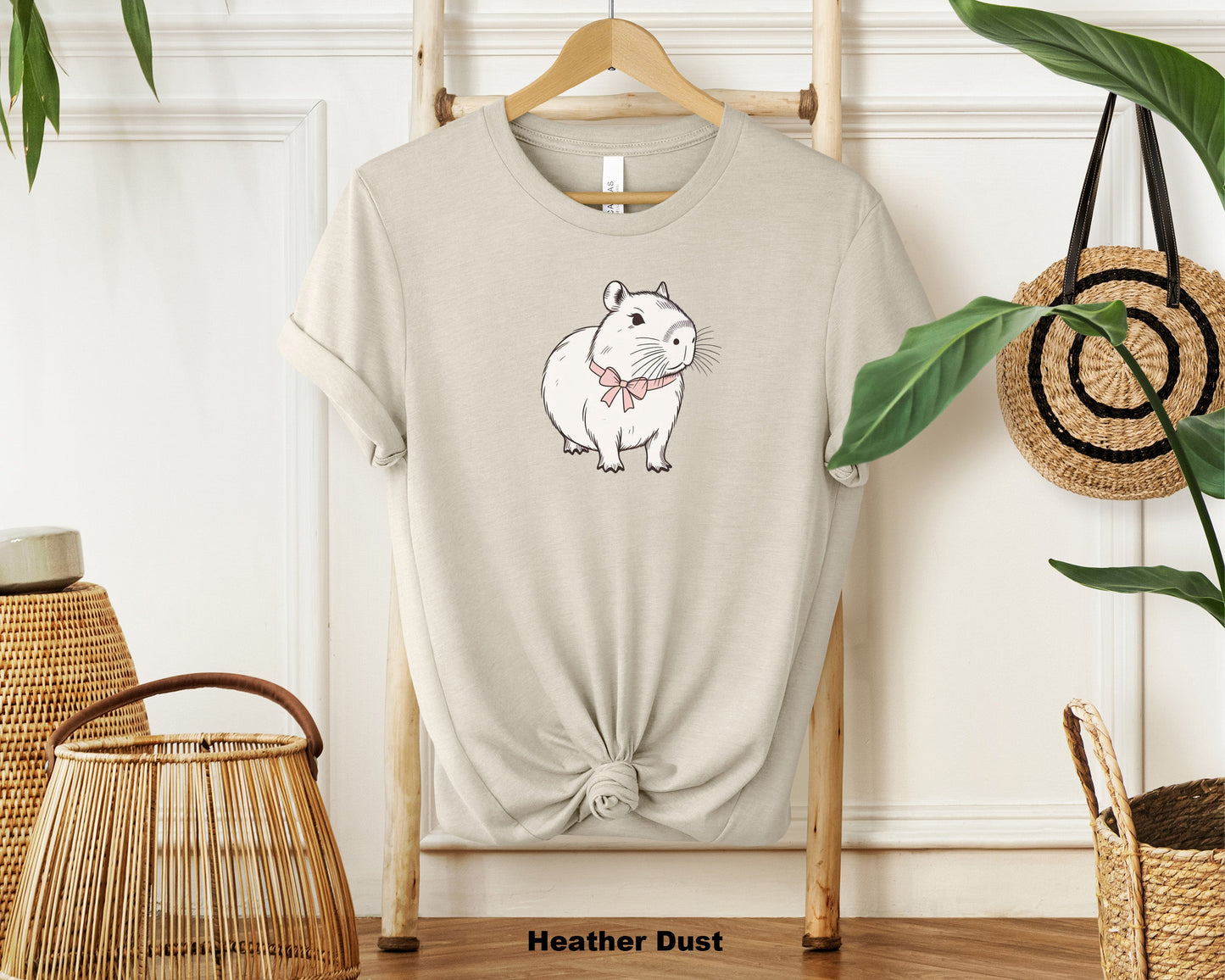 "Cute Capybara with Pink Bow Unisex T-Shirt - Trendy 2024 Fashion Statement"